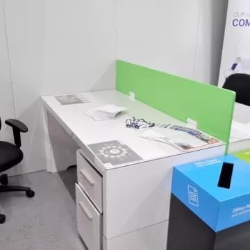 Turnkey office solutions including desk, chair and recycling boxes