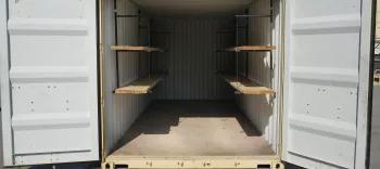 Algeco Shipping Container with doors opening showcasing wooden racking and flooring